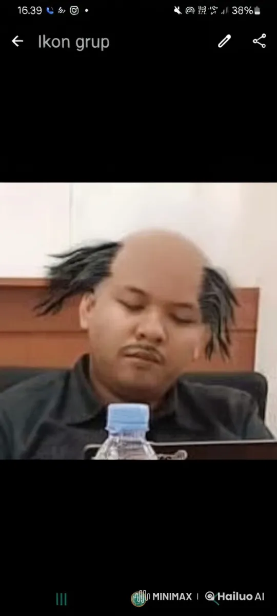 Office worker practices kungfu with unique hair tufts – AI Generated Video | Hailuo AI
