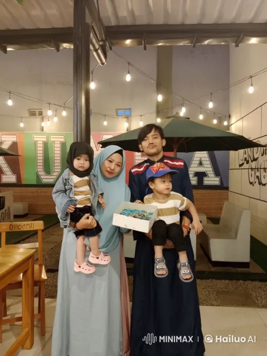 Family Kungfu Fun in Cozy Cafe Setting – AI Generated Video | Hailuo AI
