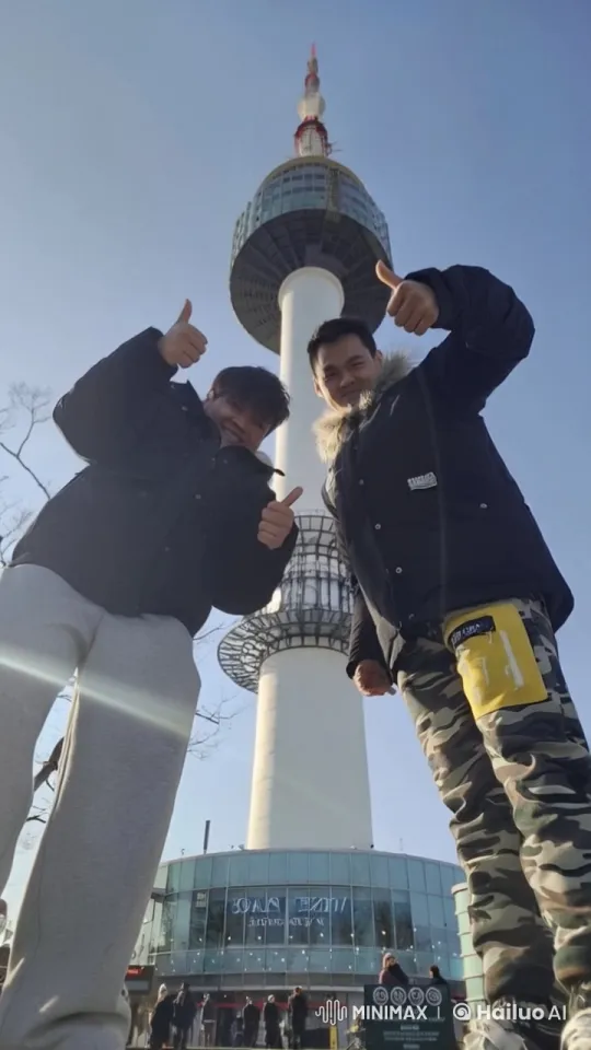 Friends Display Kung Fu Skills in Front of Tower – AI Generated Video | Hailuo AI