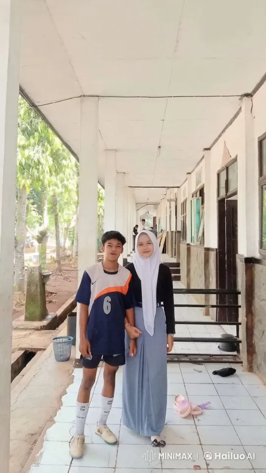 Young Couple in Corridor with Casual and Playful Atmosphere – AI Generated Video | Hailuo AI