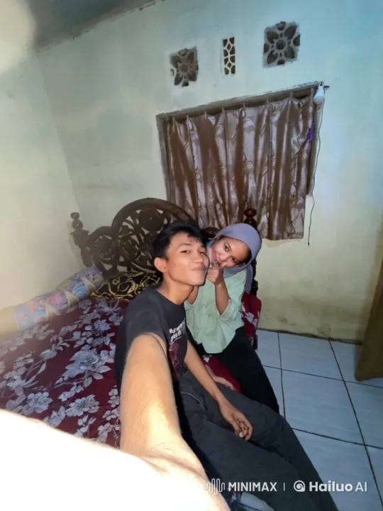 Intimate Moment Captured in Cozy Bedroom Setting – AI Generated Video | Hailuo AI