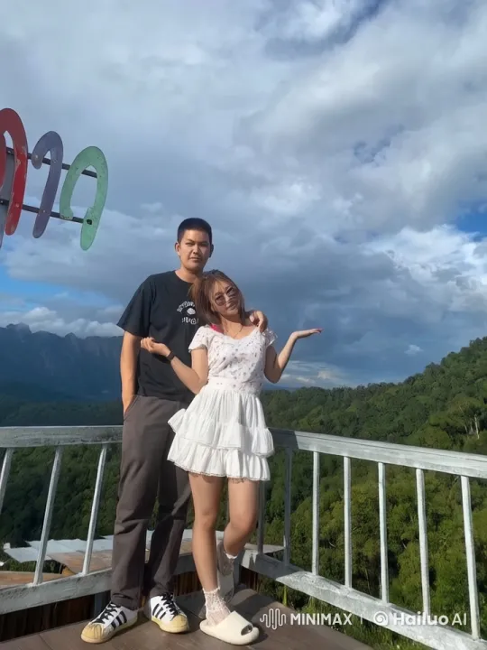 Couple Performs High-Energy Kung Fu on Mountain Balcony – AI Generated Video | Hailuo AI