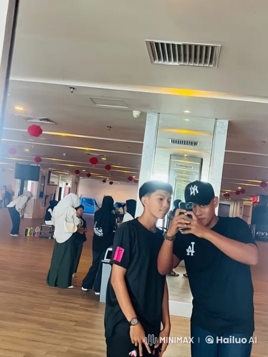 Two Young Men Perform Skilled Kung Fu in Bright Indoor Space – AI Generated Video | Hailuo AI