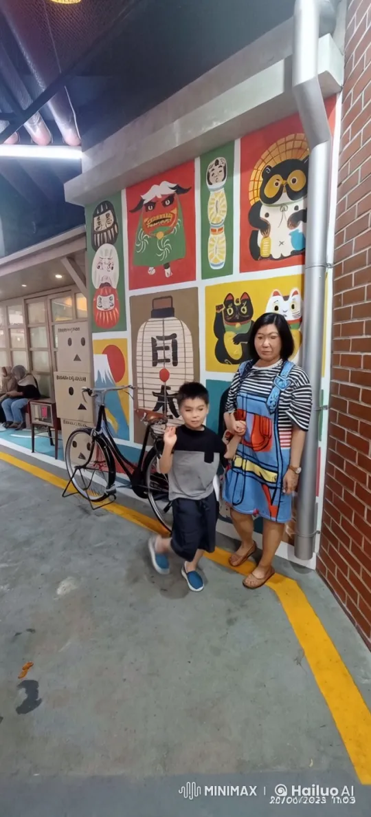Mother and Son Joyfully Practice Kung Fu in Colorful Alley – AI Generated Video | Hailuo AI