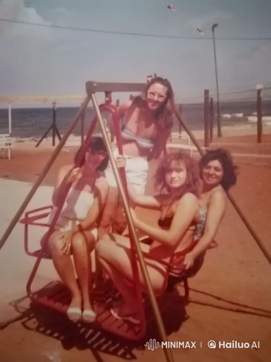 Friends Enjoy Summer Fun on Beach Swing Set – AI Generated Video | Hailuo AI