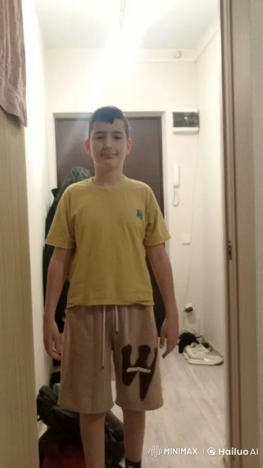 Youthful Transformation: Casual Reveal of Muscular Physique – AI Generated Video | Hailuo AI
