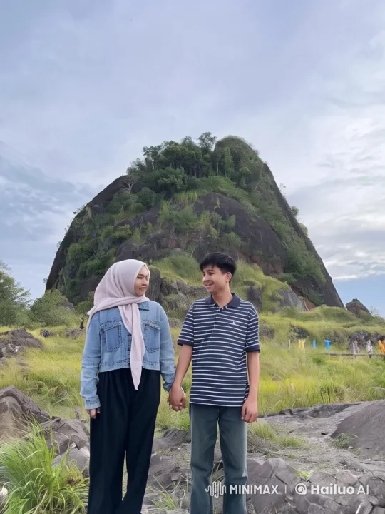 Young Couple Engages in Dynamic Kungfu on Rocky Terrain – AI Generated Video | Hailuo AI