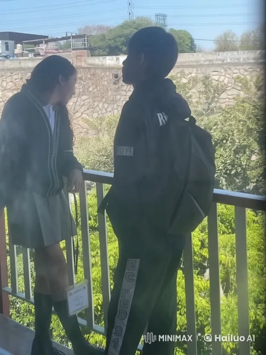 Schoolgirl and Boy Share Intimate Kiss on Balcony – AI Generated Video | Hailuo AI