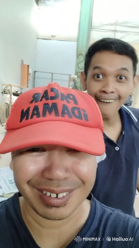Two Individuals Pose for Photo in Minimalist Indoor Setting – AI Generated Video | Hailuo AI