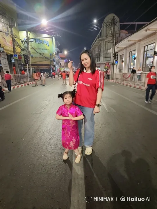 Woman and Girl Perform Kungfu on Lively Night Street – AI Generated Video | Hailuo AI