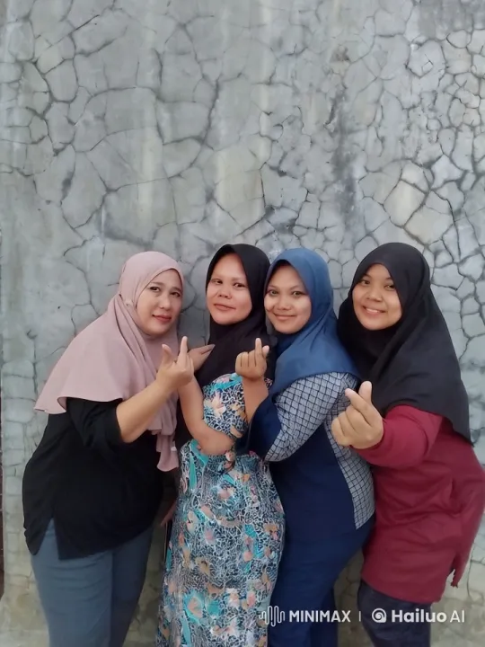Hijabi Women's Playful Kungfu Dance Against Wall – AI Generated Video | Hailuo AI