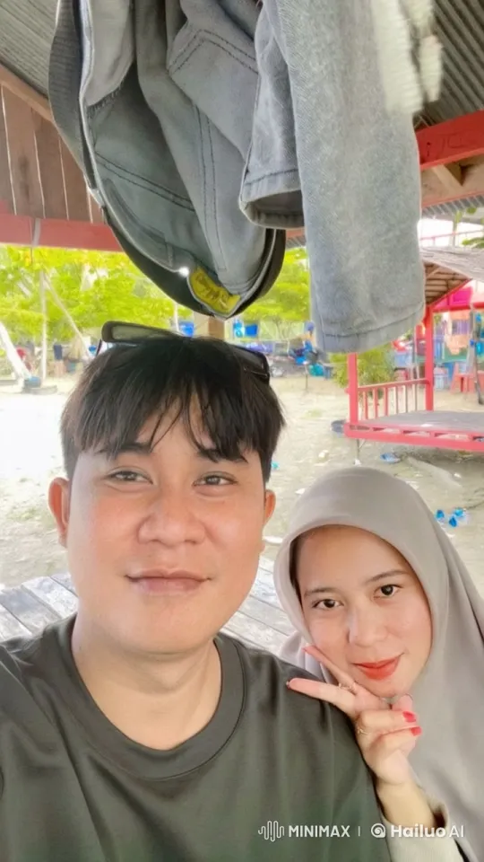 Couple Shares Tender Moment Under Wooden Shelter – AI Generated Video | Hailuo AI
