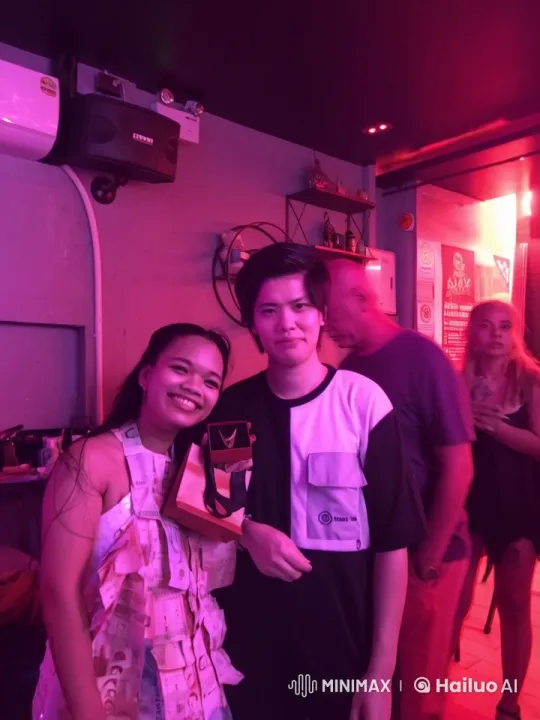 Casual Duo Performs Kungfu in Neon-Lit Bar Setting – AI Generated Video | Hailuo AI