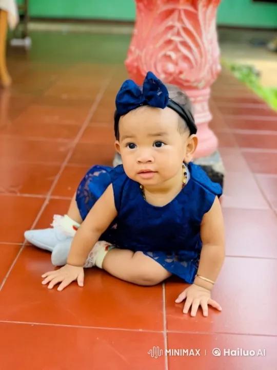 Baby's Imaginative Play: Boxing and Flying on Red Tiles – AI Generated Video | Hailuo AI