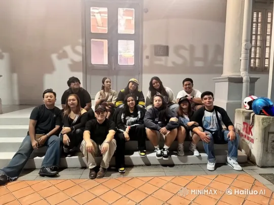 Group Engages in Playful Tussle on Outdoor Steps – AI Generated Video | Hailuo AI