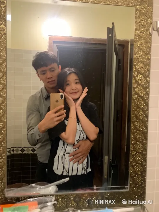 Couple Practicing Martial Arts in Bathroom Mirror – AI Generated Video | Hailuo AI
