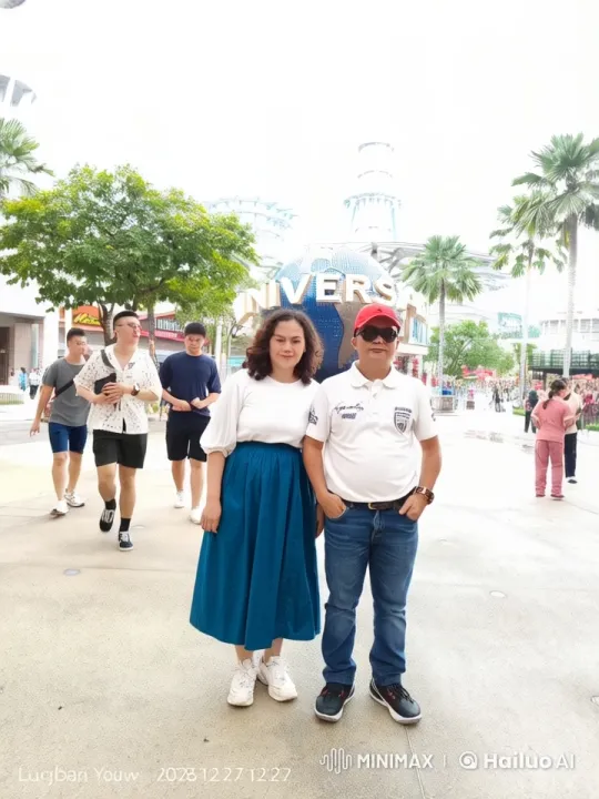 Couple Performs Kungfu in Front of Universal Studios Globe – AI Generated Video | Hailuo AI