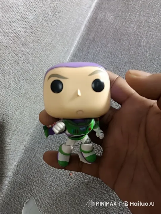 Buzz Lightyear Figure Shows Animated Smile and Eye Lighting – AI Generated Video | Hailuo AI