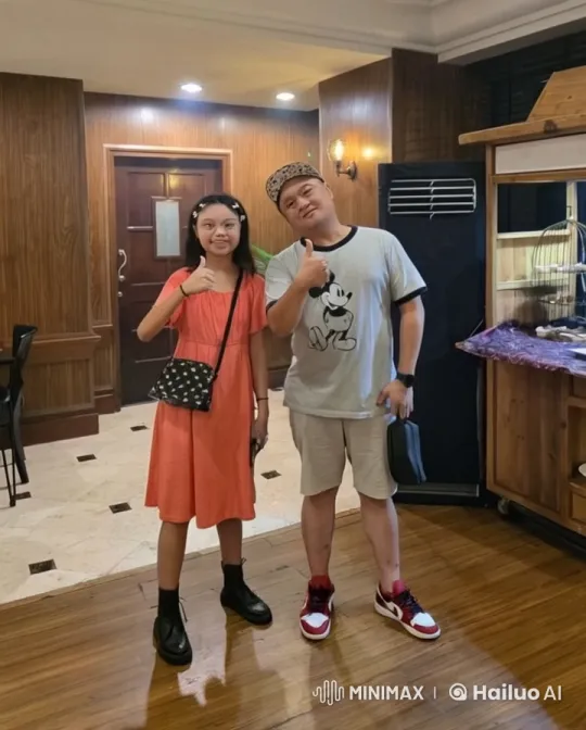 Girl and Man Perform Playful Kungfu Poses – AI Generated Video | Hailuo AI