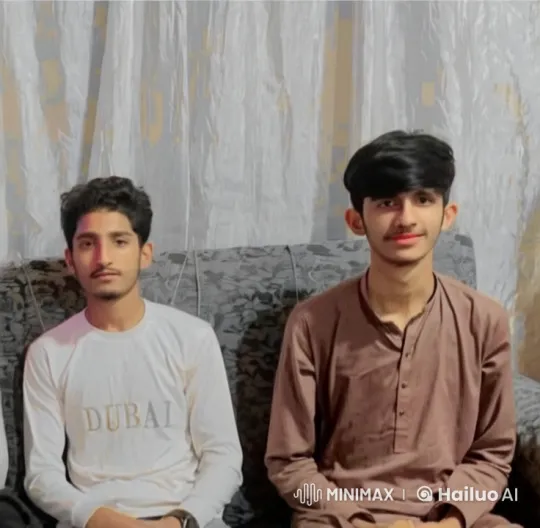 Young Men Share Intimate Moment on Sofa – AI Generated Video | Hailuo AI