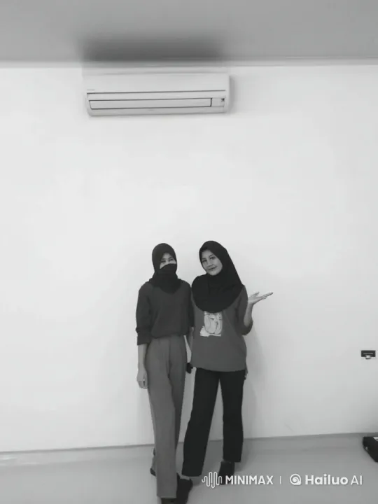 Two Hijab-Wearing Women Perform Kung Fu in Minimalist Setting – AI Generated Video | Hailuo AI