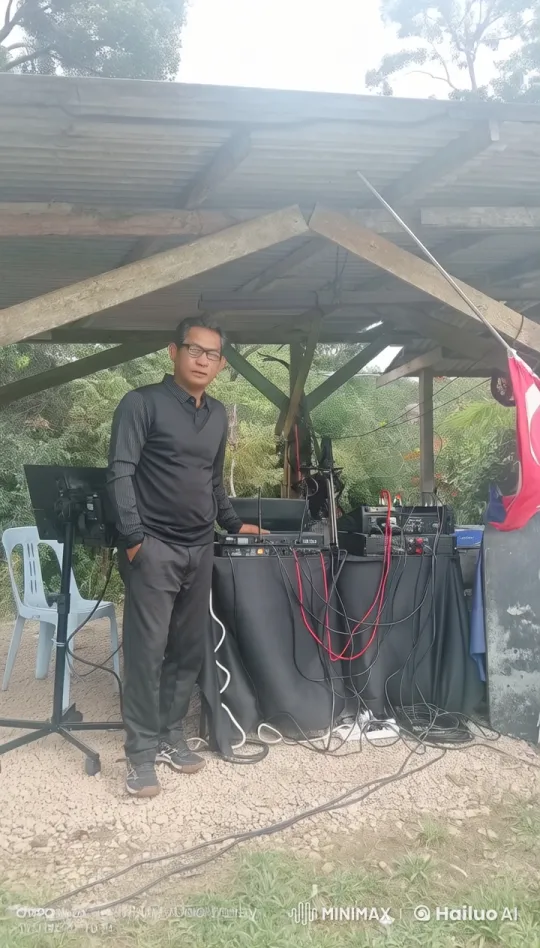 Person Prepares for Audio Work in Rustic Outdoor Setting – AI Generated Video | Hailuo AI