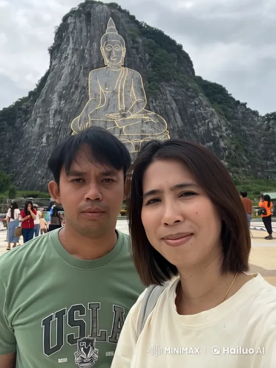 Couple's Bond Amidst Mountain Buddha and Tourists – AI Generated Video | Hailuo AI