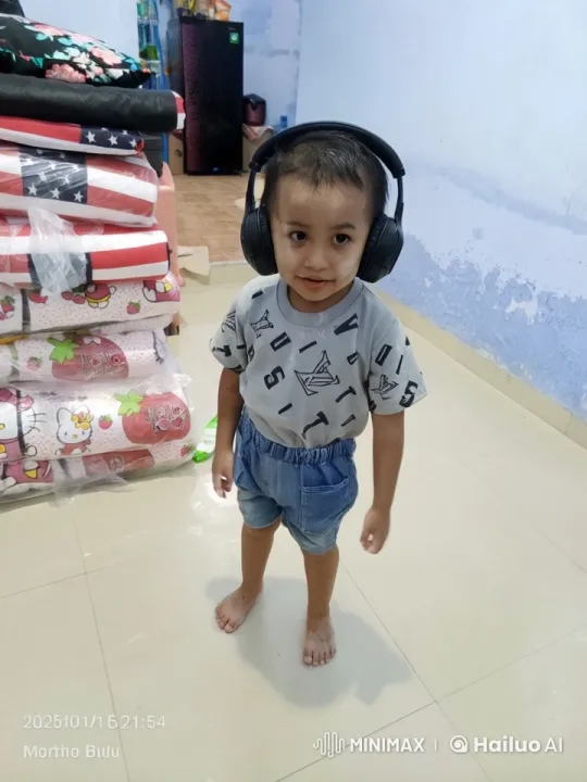 Child Dancing Barefoot in Half-Painted Room – AI Generated Video | Hailuo AI