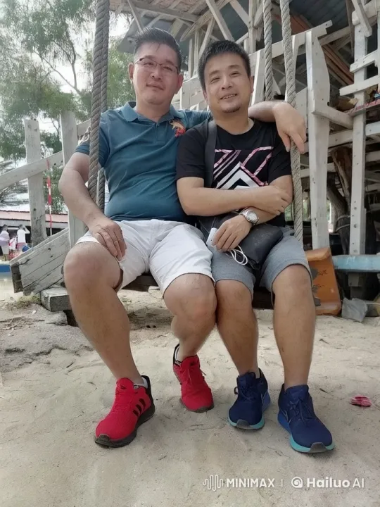 Two Men Relaxing on a Swing in a Rustic Setting – AI Generated Video | Hailuo AI