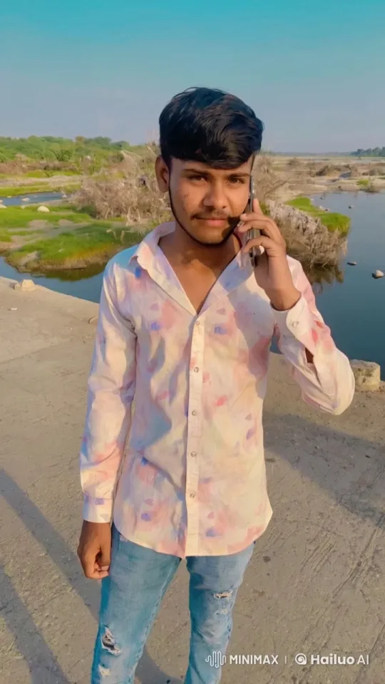 Young Man Converses by a Serene Lake – AI Generated Video | Hailuo AI