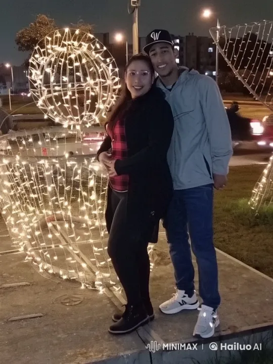 Couple Performs Martial Arts in Festive Light Display – AI Generated Video | Hailuo AI