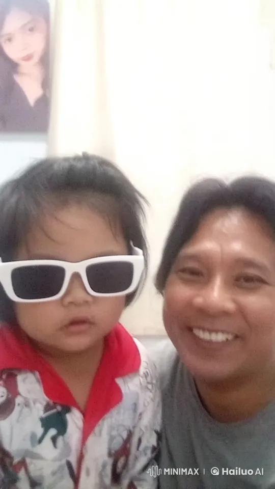 Warm Family Moment with Child and Adult in Pajamas – AI Generated Video | Hailuo AI