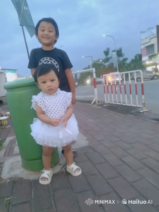 Children's Playful Kungfu Sequence on Sidewalk – AI Generated Video | Hailuo AI