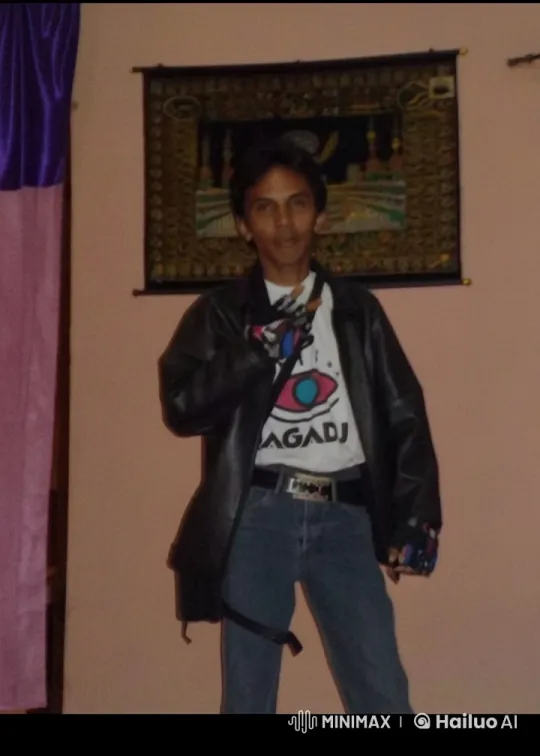 Confident Person in Graphic T-Shirt and Leather Jacket – AI Generated Video | Hailuo AI