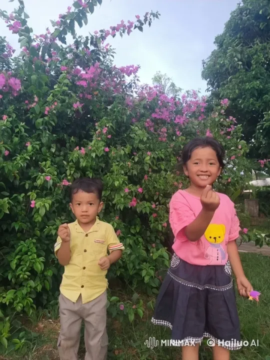 Children Perform Energetic Kungfu in Flowered Setting – AI Generated Video | Hailuo AI