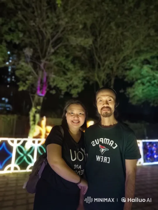 Couple Performs Synchronized Kungfu Under Decorative Lights – AI Generated Video | Hailuo AI