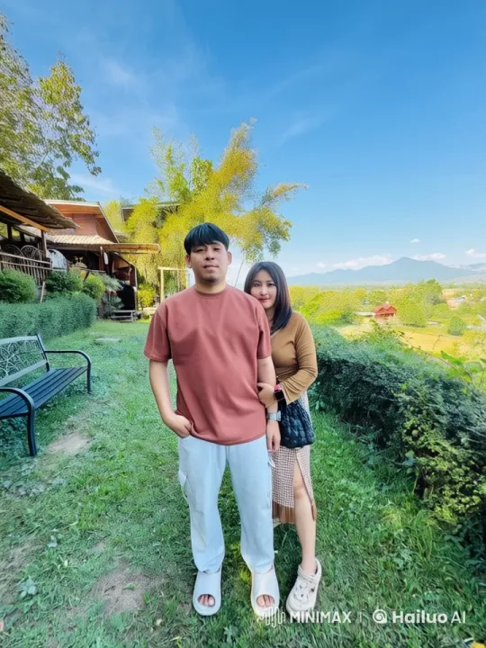 Couple Embracing in Lush Nature with Mountain View – AI Generated Video | Hailuo AI
