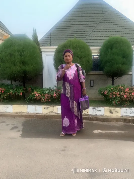 Woman in Purple Performs Kung Fu in Suburban Setting – AI Generated Video | Hailuo AI