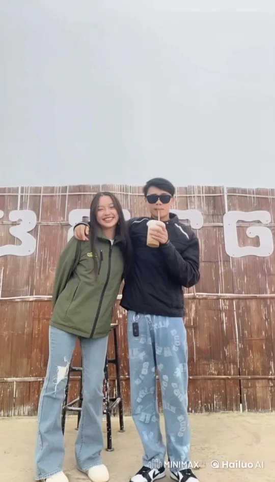 Live2D Animated Duo with Drinks by Wooden Fence – AI Generated Video | Hailuo AI