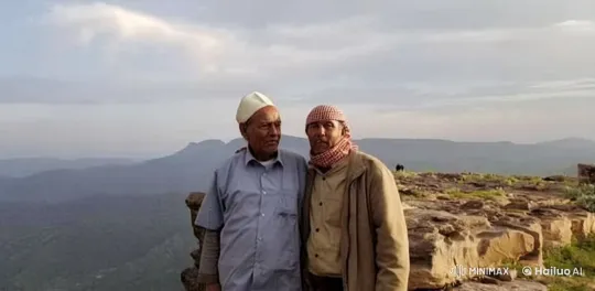 Two Men Playfully Spar on Mountainous Rock Ledge – AI Generated Video | Hailuo AI