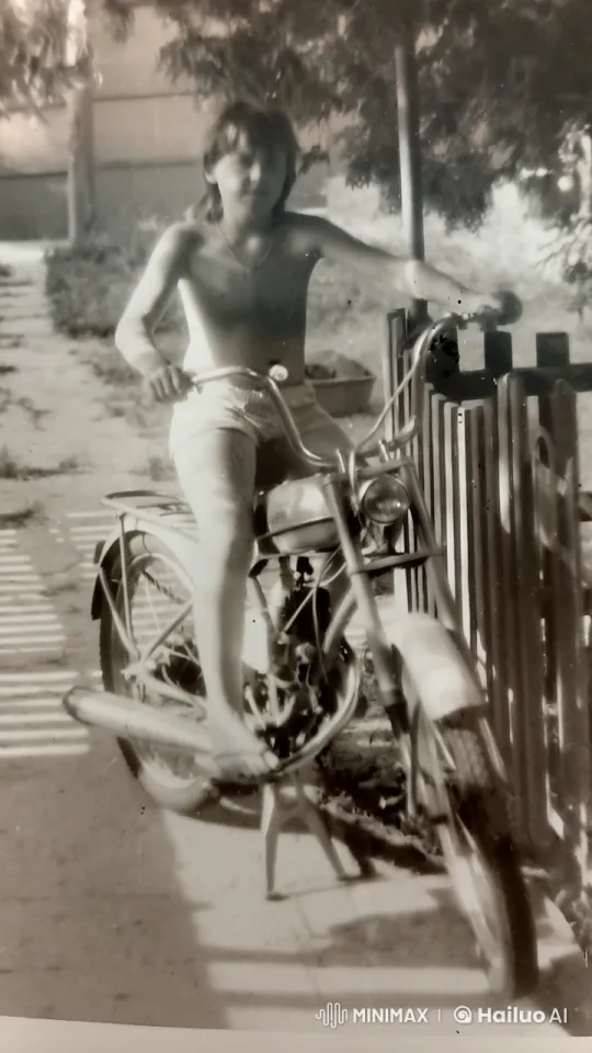 Nostalgic Boy Riding Vintage Motorcycle in Tranquil Setting – AI Generated Video | Hailuo AI