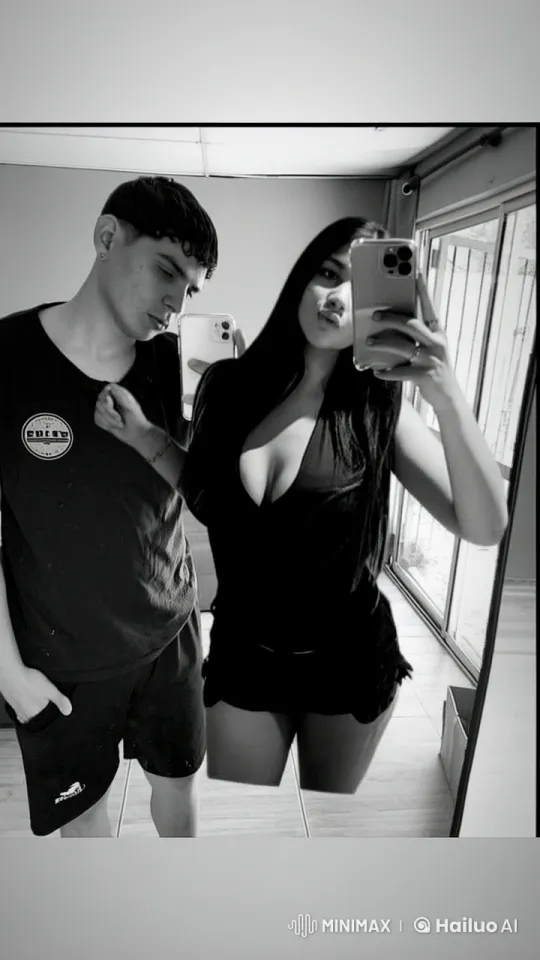 Couple in Mirror Share Intimate Moment – AI Generated Video | Hailuo AI