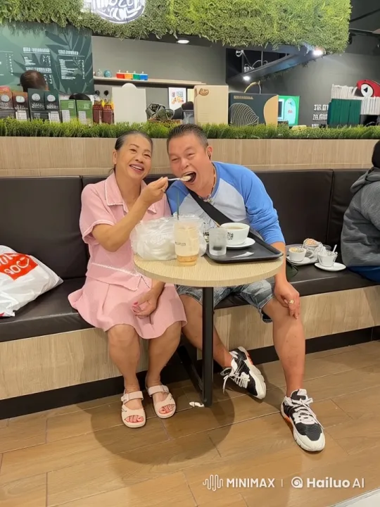 Elderly Woman and Man Enjoying Coffee and Dessert in Café – AI Generated Video | Hailuo AI