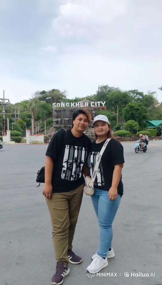 Kung Fu Duel in Front of Songkhla City Sign – AI Generated Video | Hailuo AI