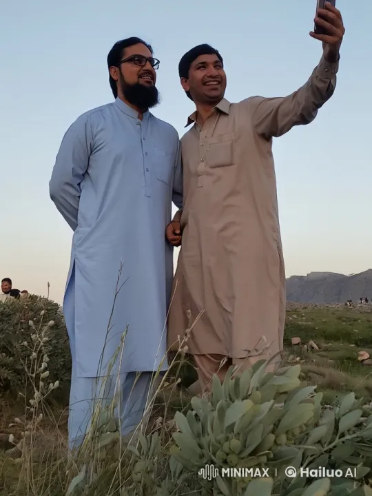 Traditional Clothing Men Spar in Mountainous Landscape – AI Generated Video | Hailuo AI