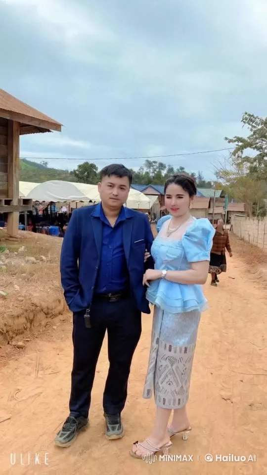 Formal Attire Martial Arts Display in Rustic Village Setting – AI Generated Video | Hailuo AI