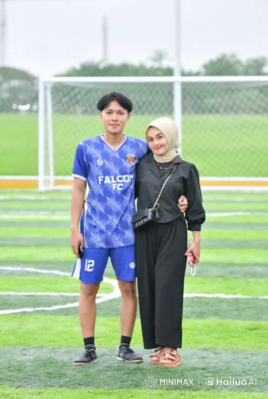 Martial Arts Display on Soccer Field with Supportive Observer – AI Generated Video | Hailuo AI
