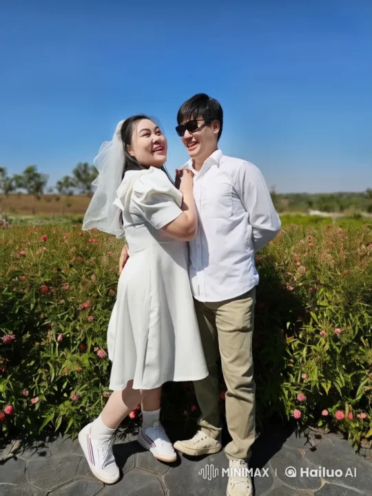 Casual Attired Couple Engages in Dynamic Martial Arts Fight in Serene Garden – AI Generated Video | Hailuo AI