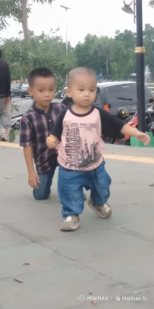 Urban Sidewalk: Kids' Energetic Kungfu Fight – AI Generated Video | Hailuo AI