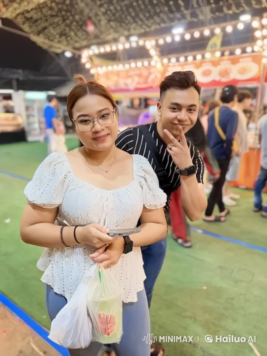 Intense Martial Arts Battle in Bustling Night Market – AI Generated Video | Hailuo AI